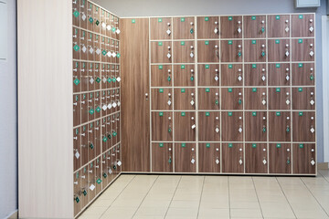 lockers with numbers in fitness center. gym storage system