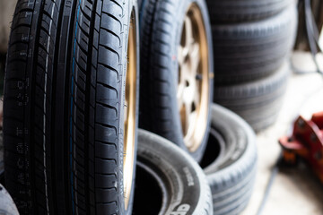 Car tires rack showing for sell or fix in the shop
