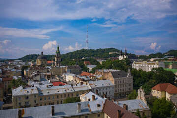  Aerial view on Market square, Dormition, Dominican and Carmelite Church in Lviv, Ukraine from drone