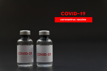 Corona virus vaccine in bottles. The medical concept.