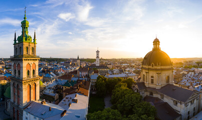 Fototapeta na wymiar Aerial view on Dominican Church and Dormition Church in Lviv, Ukraine from drone