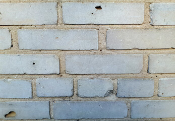 Wall from white bricks texture close-up backdrop background