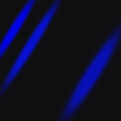 Abstract black background with blue neon light effect glare rays and empty space for text.