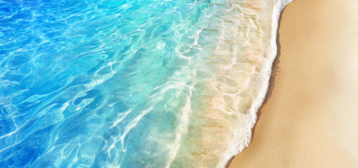 Beautiful tropical wave of summer sea surf. Soft turquoise blue ocean wave on the golden sandy...