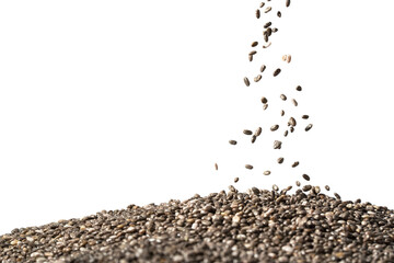 Close up of chia seeds falling and landing in to a large pile in the right side and isolated on white background