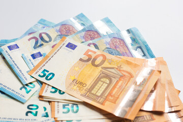 Euro money various value 20 50 100 euro background selective focus