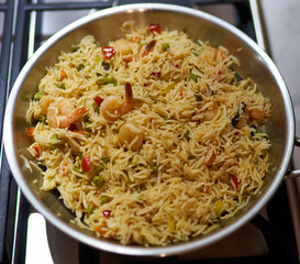 risotto is in a skillet in the kitchen