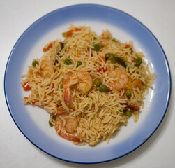 risotto is on a plate in the kitchen