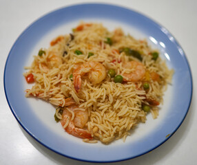 risotto is on a plate in the kitchen