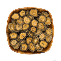Chinese dried edible mushrooms in wooden bowl
