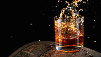 Whiskey Liquid falling into Glass, Freeze Motion.