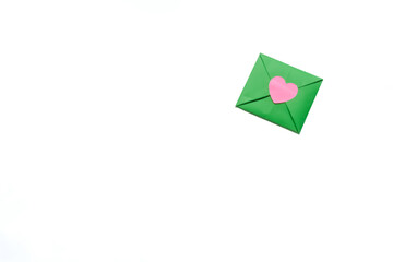 Green envelope isolated on a white background.  Valentine's day gift.  Valentine's day concept. Space for text.
