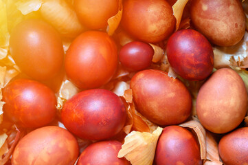 easter eggs painted onion husks. coloring the eggs according to the old natural eco-friendly method with peeled onions. flare