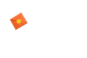 Orange envelope isolated on a white background. Valentine's day gift. Valentine's day concept. Space for text.
