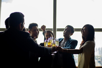 Happiness small Asia business new year party at restaurant after work.