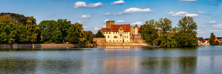 Fototapeta na wymiar Germany, castle Flechtingen surrounded by a lake is a well known tourist attraction in Saxony-Anhalt