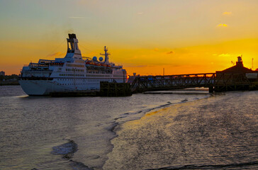 Silhouette of classic cruiseship or cruise ship liner Astor in port of Tilbury, London on River...