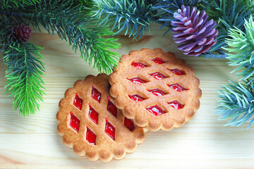 Christmas cookies with marmalade on wooden surface