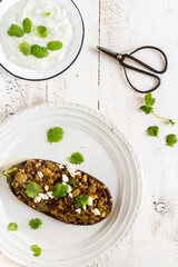 Stuffed aubergine on the white background