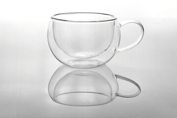 Glass cup for tea on a white background.