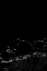 Close up of soap bubbles on flat surface