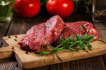Fresh raw beef steak sirloin with rosemary