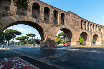 Fototapeta na wymiar The Aurelian Walls of Emperor Aurelian to defend Rome, the capital of the empire, from possible attacks by the barbarians. Via Appia near the Baths of Caracalla, the Circus Maximus in Rome, Italy.