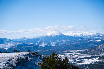 Obraz na płótnie Canvas Snowy landscape of a large snowy mountain