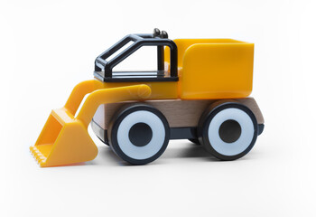 Colorful plastic and wooden toy car on on isolated white background