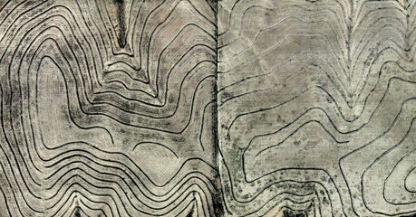 the thirst,   United States, abstract photography of relief drawings in  fields in the U.S.A. from...