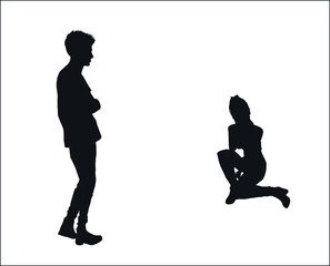 Standing young boy looking at the sitting girl silhouettes isolated on the white fashion modeling poses.