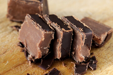 Pieces of chocolate candy closeup. Shallow depth of field