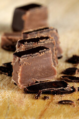 Pieces of chocolate candy closeup. Shallow depth of field