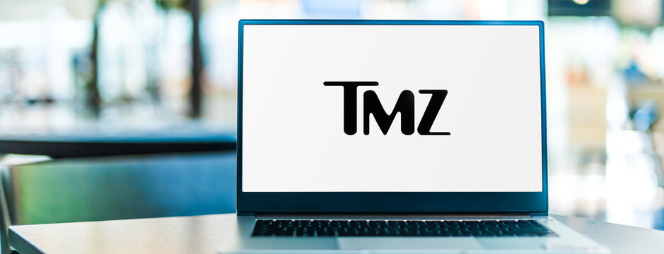 Laptop computer displaying logo of TMZ