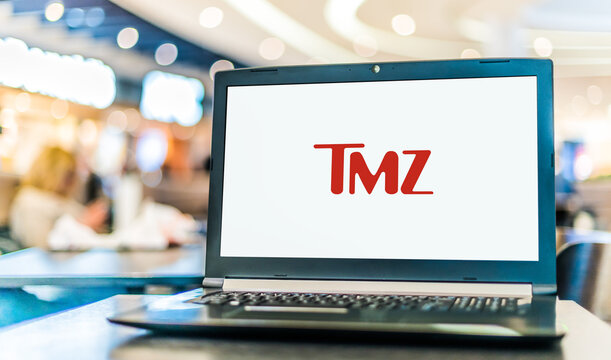 Laptop computer displaying logo of TMZ
