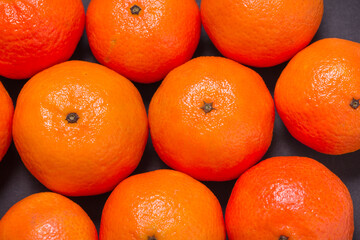 Close up lot of orange fresh natural mandarines