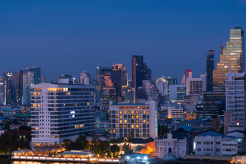 Fototapeta na wymiar Bangkok city scape at night with down town business district.