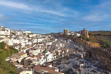 Aerial or skyline view of one of the beautiful white villages of the province of Cadiz, Setenil de las Bodegas, Andalusia, Spain © Maria