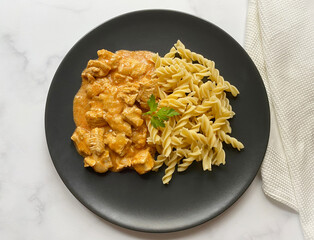 Classic chicken goulash with fusilli pasta in sour creme gravy. 