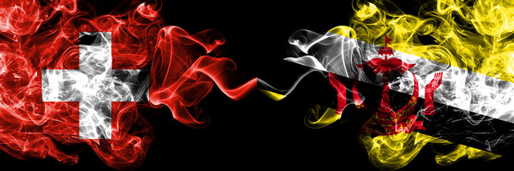 Switzerland, Swiss vs Brunei, Bruneian smoky mystic flags placed side by side. Thick colored silky abstract smoke flags.