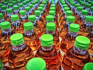 Full Frame Background of Group of Cooking Oil Bottles at Store