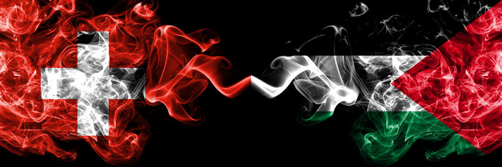 Switzerland, Swiss vs Palestine, Palestinian smoky mystic flags placed side by side. Thick colored silky abstract smoke flags.