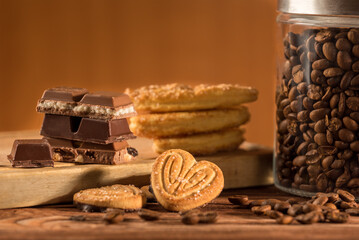 cookies and chocolate on a wooden surface