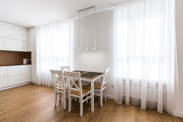 Interior photography, large white kitchen studio in a modern style, minimalism