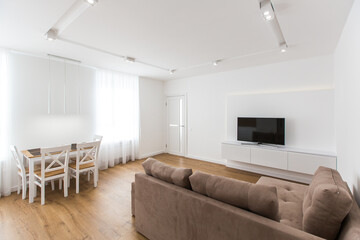 Interior photography, large white kitchen studio in a modern style, minimalism