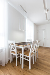 Fototapeta na wymiar Interior photography, large white kitchen studio in a modern style, minimalism
