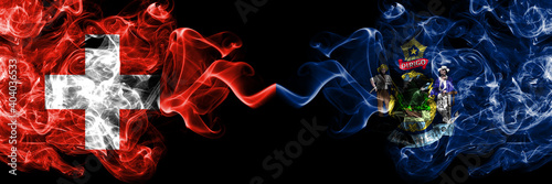 Switzerland, Swiss vs United States of America, America, US, USA, American, Maine smoky mystic flags placed side by side. Thick colored silky abstract smoke flags.