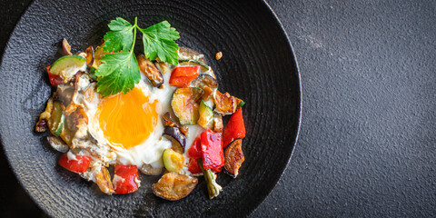 fried eggs with vegetables omelet ready to cook and eat on the table for healthy meal snack outdoor top view copy space for text food background rustic image keto or paleo diet