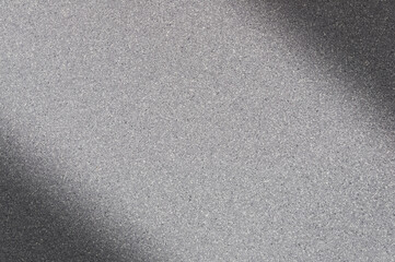 Obraz premium Granite background of gray color with small dots. Darkening left and right diagonally.