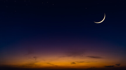 Obraz na płótnie Canvas Dusk sky with crescent moon and stars